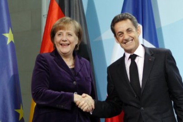 Angela Merkel met en garde la Grèce et prévoit d'adopter la taxe Tobin