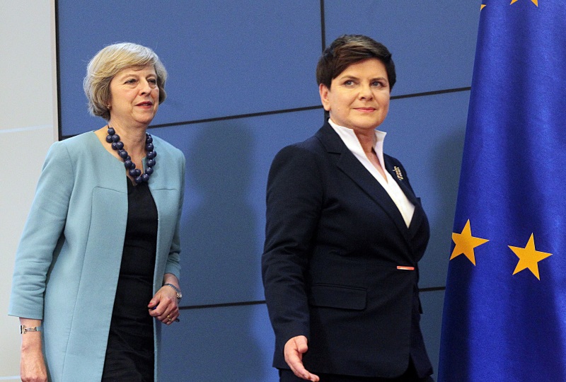 Theresa May tente de rassurer Varsovie sur l’avenir des Polonais au Royaume-Uni