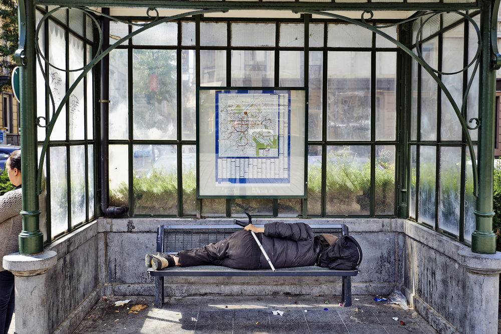 Homeless_bus_shelter_Belgium_poverty_CREDIT[pbombaert_Shutterstock]