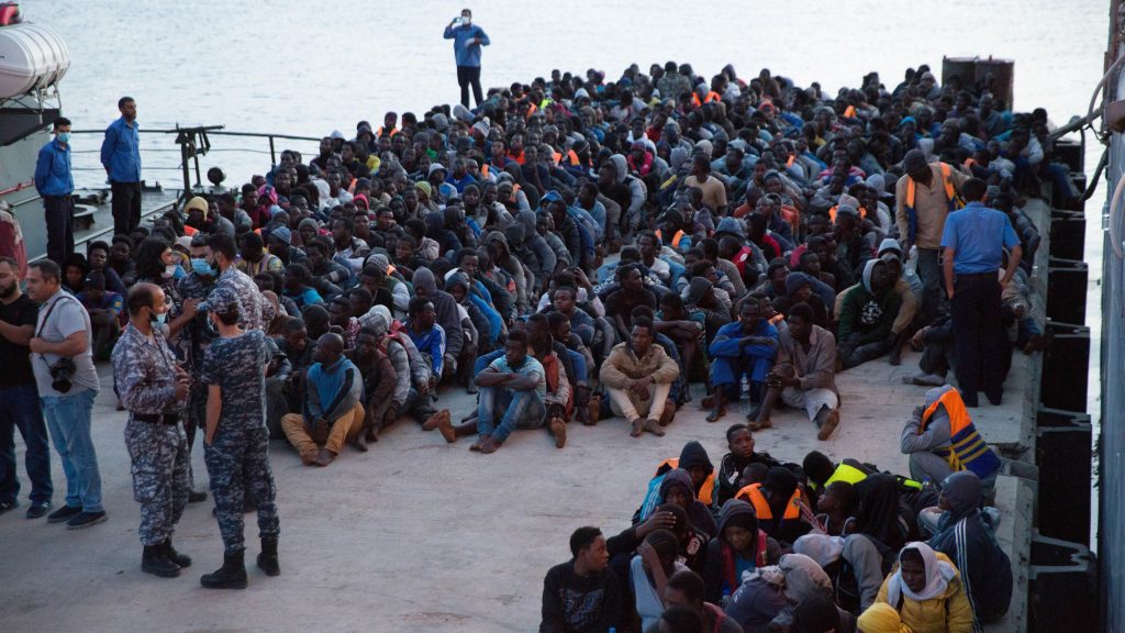 epa05992314 African migrants, who were rescued by the Libyan coastguard in the Mediterranean off the Libyan coast, arrive at a naval base in Tripoli, Libya, on 26 May 2017. The Libyan navy said. &lsquo;At least 20 boats carrying thousands of migrants on their way to Italy were spotted off the coast of the western city of Sabratha&rsquo;  EPA/STR
