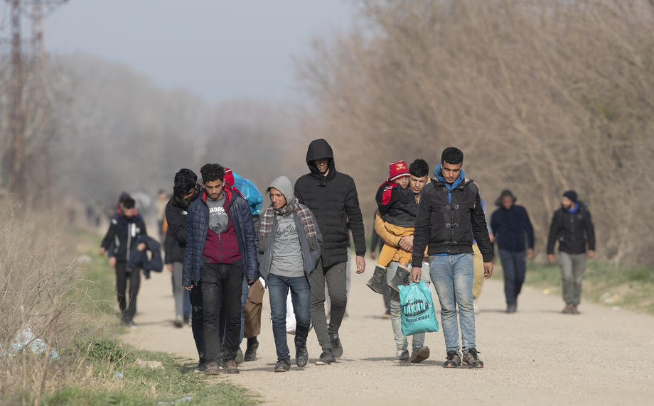 Refugees and migrants gather at the Turkish-Greek land border