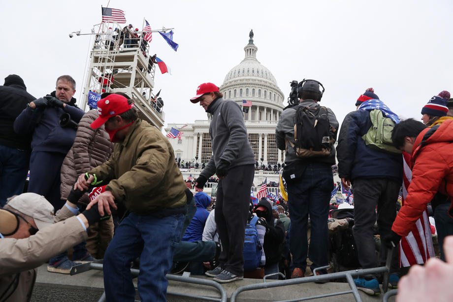 Pro-Trump rally outside capitol as US Congress counts electoral college votes