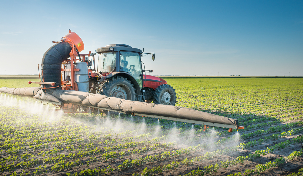 Tractor,Spraying,Pesticides,On,Soy,Bean