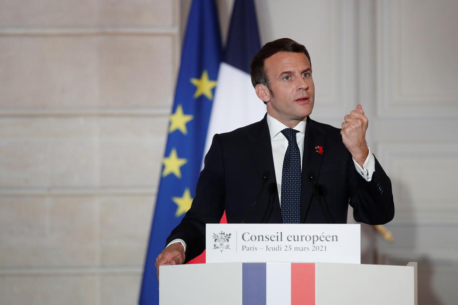 French President Emmanuel Macron attends a press conference after a European Council summit held over video-conference in Paris
