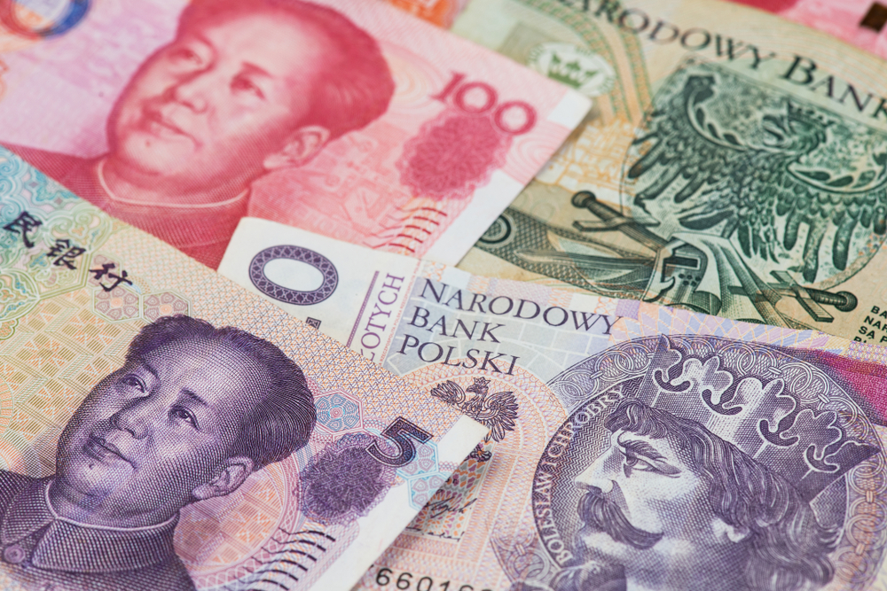 Poland,Zloty,And,China,Yuan,Renminbi,Currency,Banknotes,Close,Up