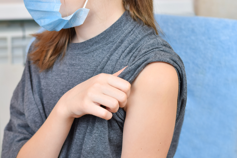 Young,Girl,Wearing,Blue,Protective,Mask,Getting,Ready,To,Be