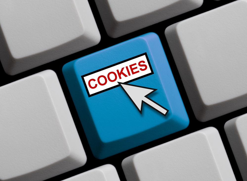 Computer,Keyboard,With,Mouse,Arrow,Showing,Cookies