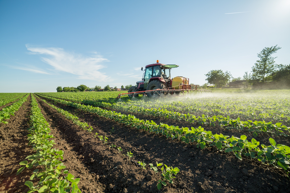 Farmer,Spraying,Soybean,Field,With,Pesticides,And,Herbicides