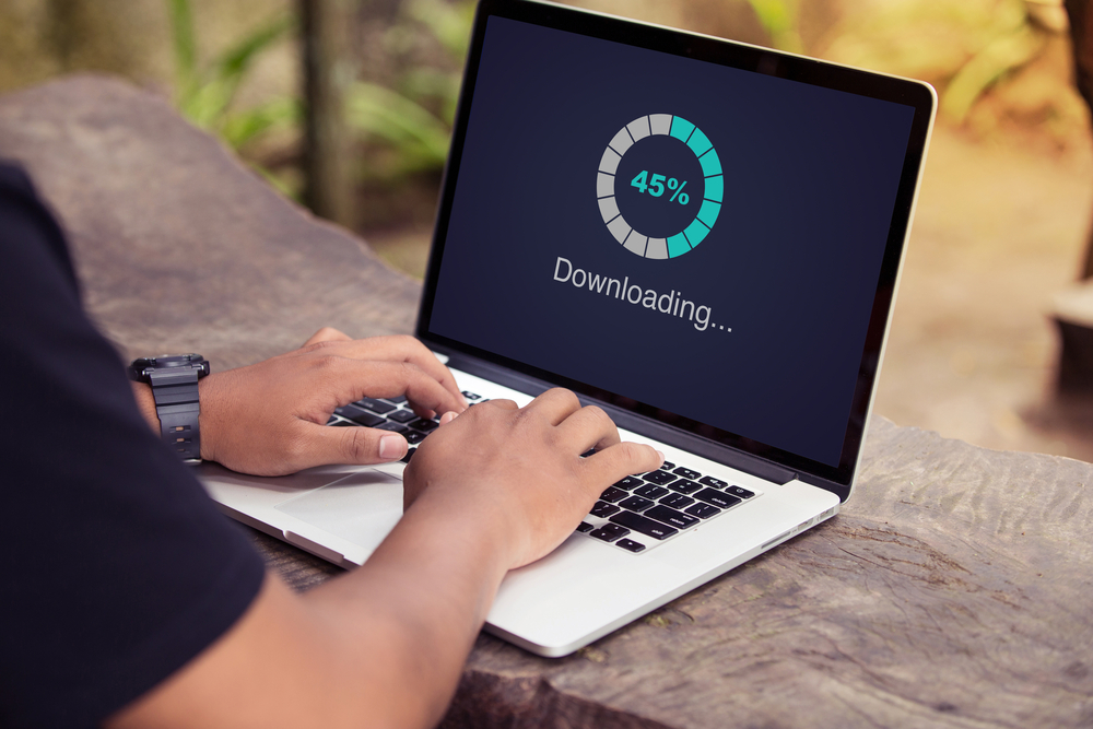 Download,Processing,Data,On,Laptop,With,Internet