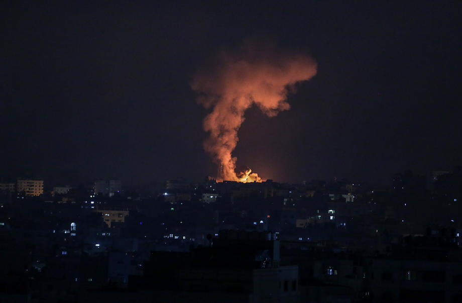 Smoke and flames rise after an Israeli airstrike in the northern Gaza strip