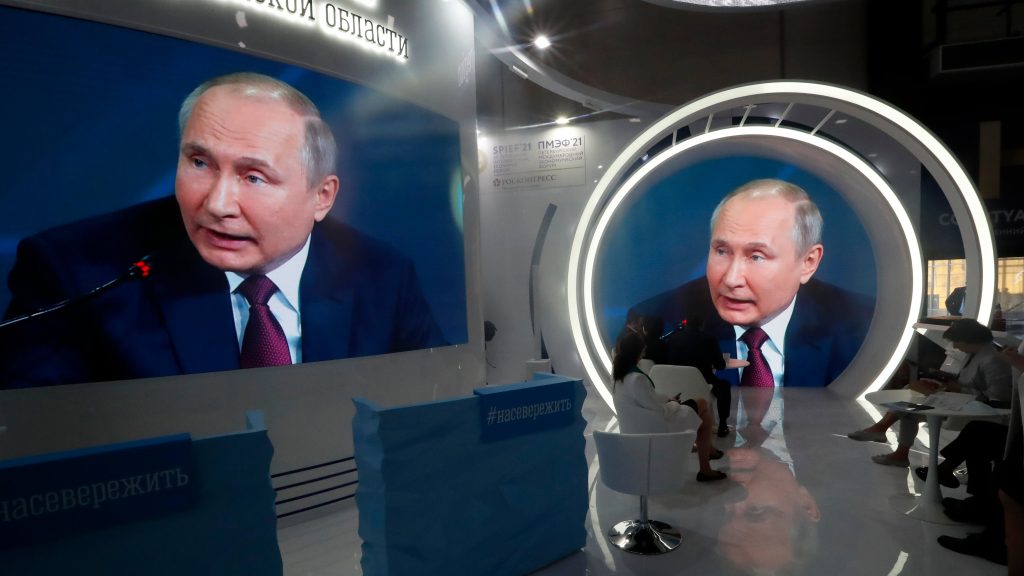 epa09247645 A large screen shows Russian President Vladimir Putin at the plenary session of the St. Petersburg International Economic Forum (SPIEF) in St. Petersburg, Russia, 04 June 2021. The 24th St.Petersburg International Economic Forum runs from 02 to 05 June 2021.  EPA-EFE/ANATOLY MALTSEV