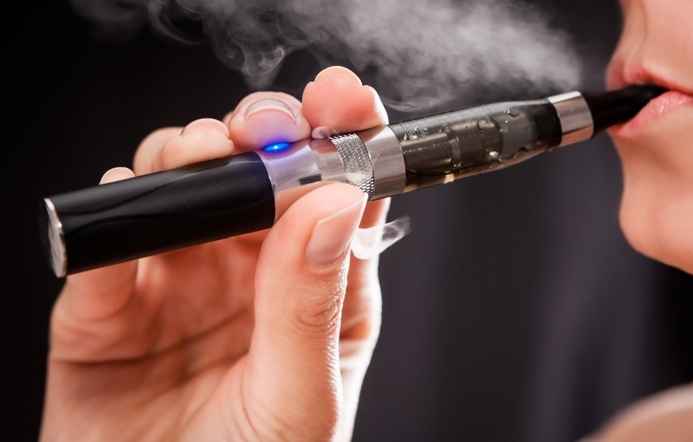 Close,Up,Of,A,Woman,Inhaling,From,An,Electronic,Cigarette