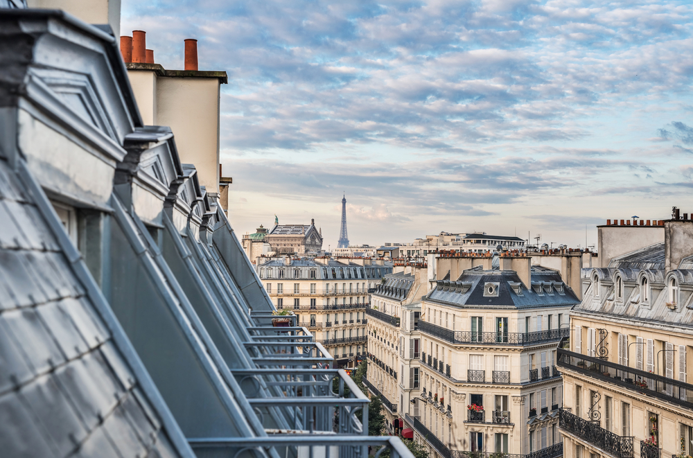 Paris,Roofs,With,Eiffel,Tower,In,Background,,France