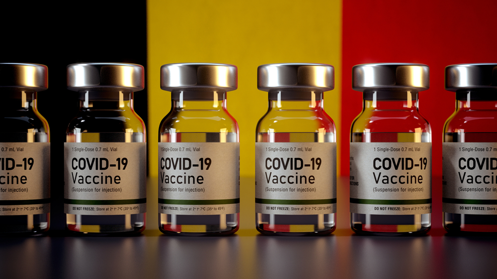 Covid,Vaccine,Bottle,With,The,Belgium,Flag,In,The,Background