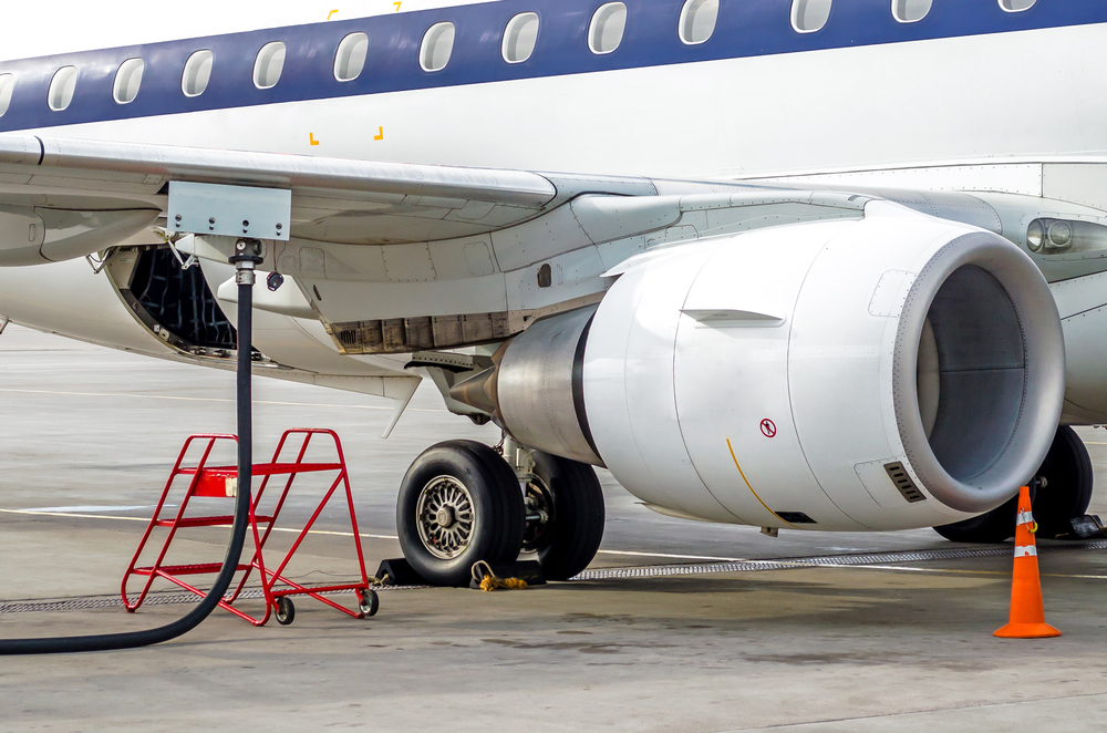 Fueling,Aircraft,,View,Of,The,Wing,,Hose,,Engine,Airport,Service