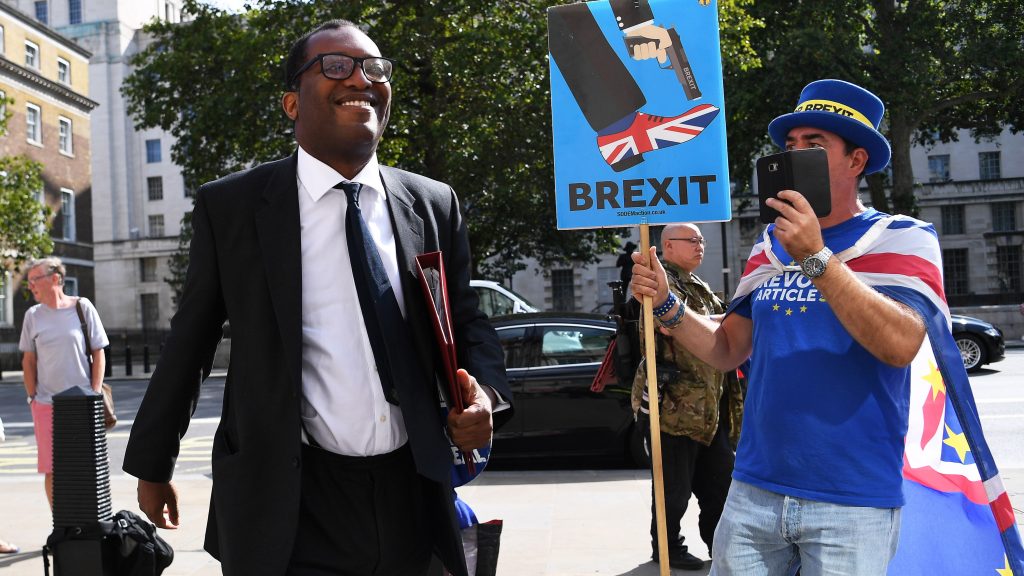 epa07781798 British Minister of State for Business, Energy and Clean Growth, Kwasi Kwarteng (L) arrives at the Cabinet Office in London, Britain, 20 August 2019.  EPA-EFE/ANDY RAIN