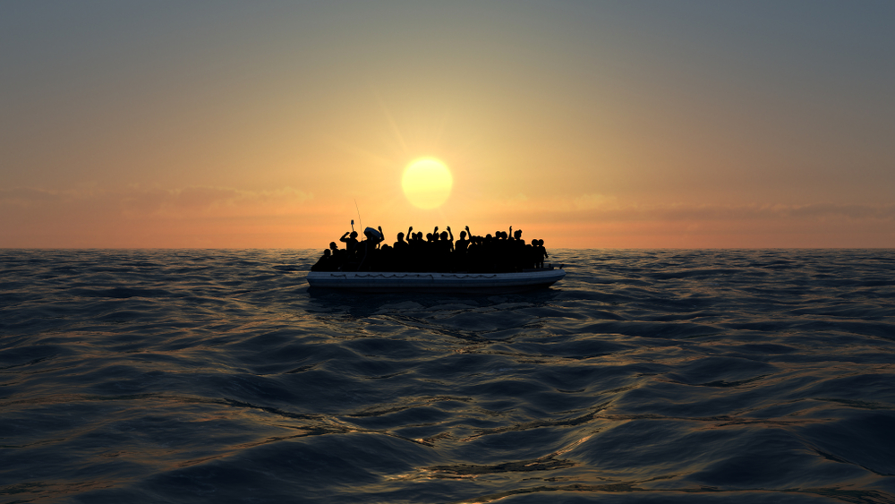 Refugees,On,A,Big,Rubber,Boat,In,The,Middle,Of