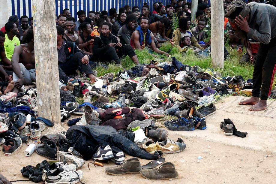 Some 300 migrants manage to reach Spain by jumping border fence in Melilla