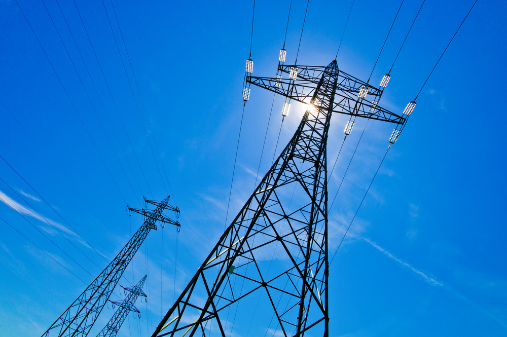A,Power,Mast,Of,A,High,Voltage,Transmission,Line,Against