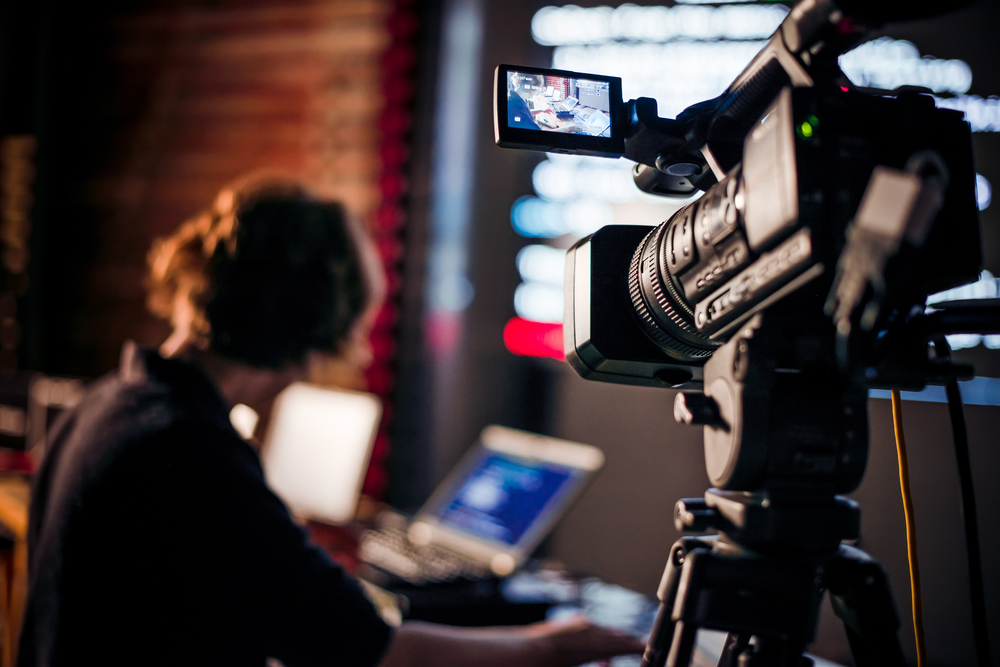 Filming,Creative,Video,Footage,With,Professional,Video,Camera,During,The