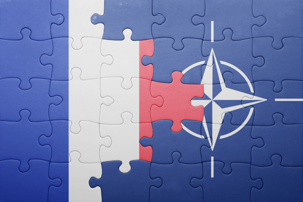 Puzzle,With,The,National,Flag,Of,France,And,Nato,.