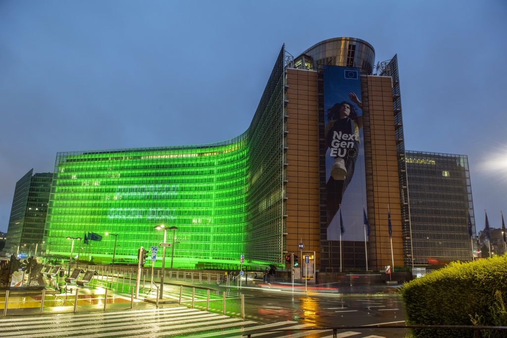 The Berlaymont building lit in green to mark European Green Deal
