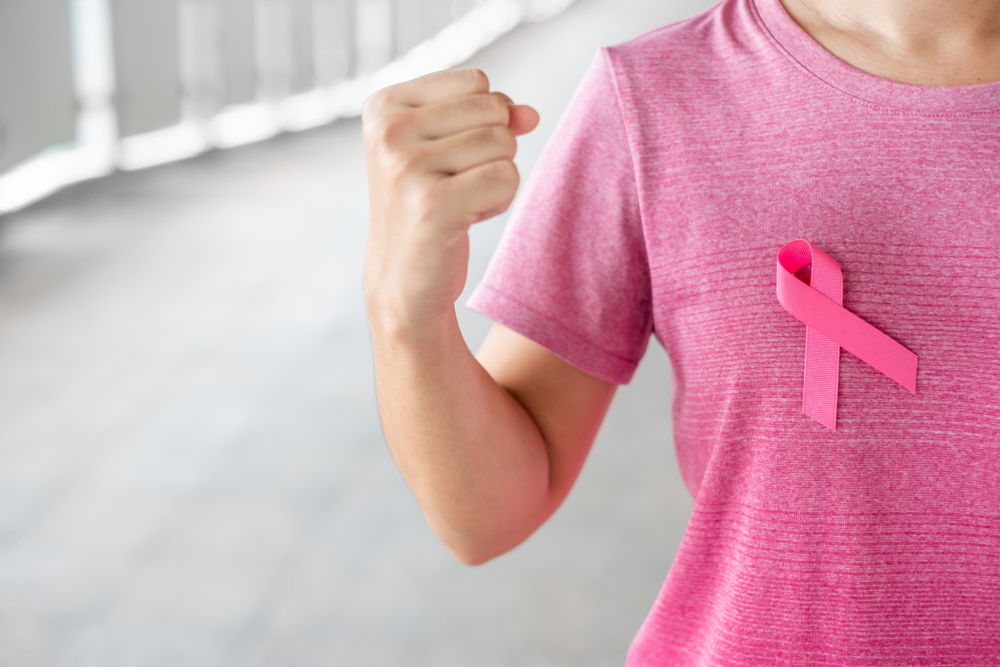 October,Breast,Cancer,Awareness,Month,,Woman,In,Pink,T-,Shirt