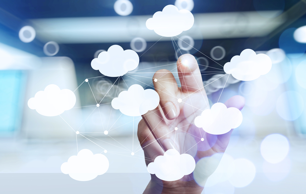 Businessman,Hand,Working,With,A,Cloud,Computing,Diagram,On,The