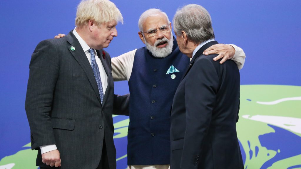 epa09557482 British Prime Minister Boris Johnson (L) and United Nations (UN) Secretary General Antonio Guterres (R) greet Indian Prime Minister Narendra Modi (C) as leaders arrive to attend the COP26 UN Climate Change Conference in Glasgow, Britain 01 November 2021. The 2021 United Nations Climate Change Conference (COP26) runs from 31 October to 12 November 2021 in Glasgow.  EPA-EFE/ROBERT PERRY