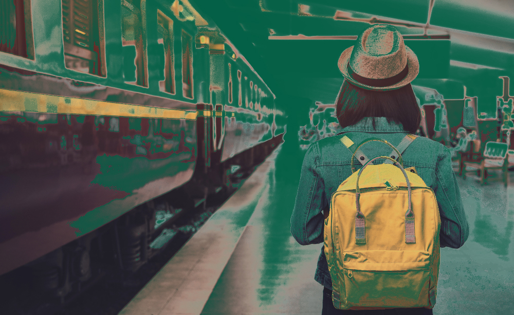 Young,Asian,Woman,Traveler,With,Backpack,In,The,Railway,,Backpack