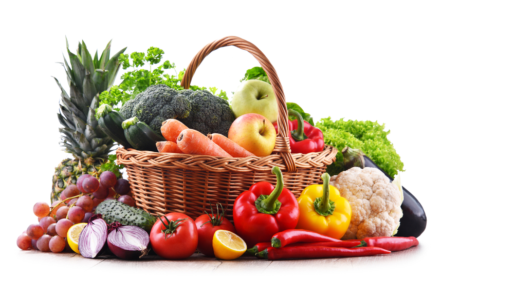 Assorted,Organic,Vegetables,And,Fruits,In,Wicker,Basket,Isolated,On
