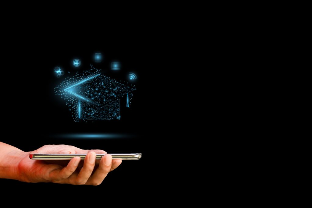 Online,Education,Concept.,Hand-holding,Smartphone,Or,Mobile,With,Low,Polygonal