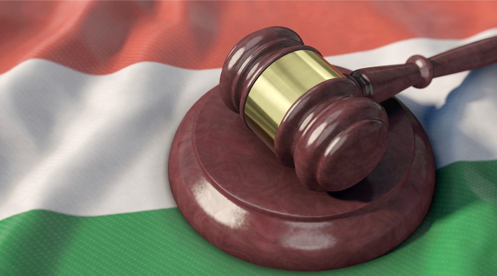 3d,Illustration,,Judge&rsquo;s,Gavel,On,The,Flag,Of,Hungarian