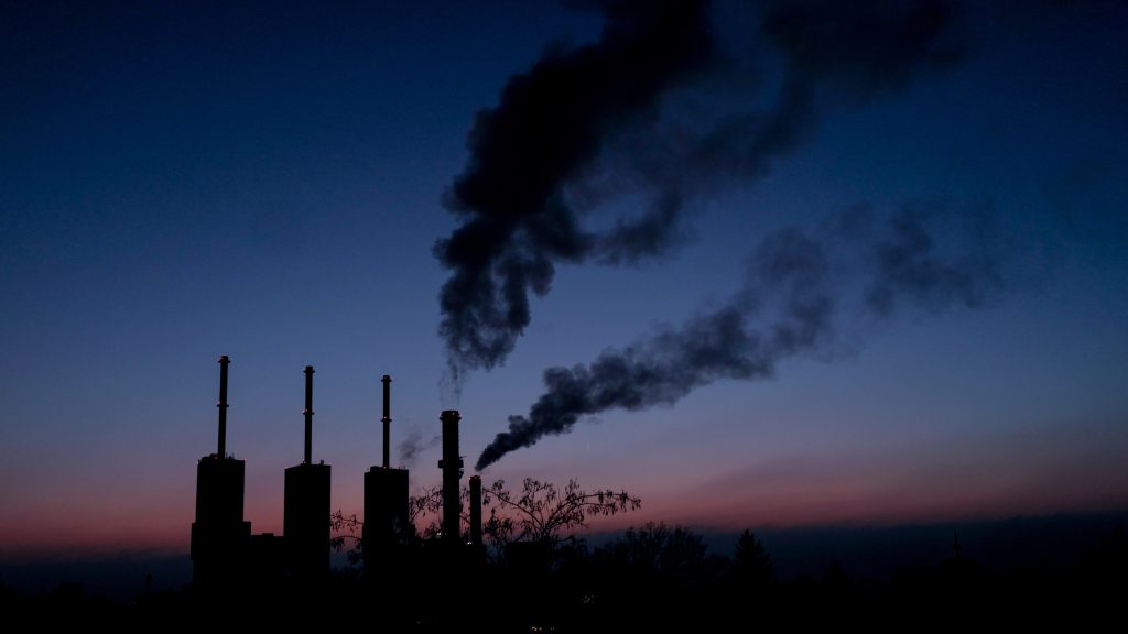 epa09679077 A view of the towers of the thermal power station during sunset in Berlin, Germany, 11 January 2022. The German Minister of Economics and Climate Protection Habeck said at a press conference on 11 January that without new measures, the 2030 climate targets would be missed in all sectors in Germany.  EPA-EFE/FILIP SINGER