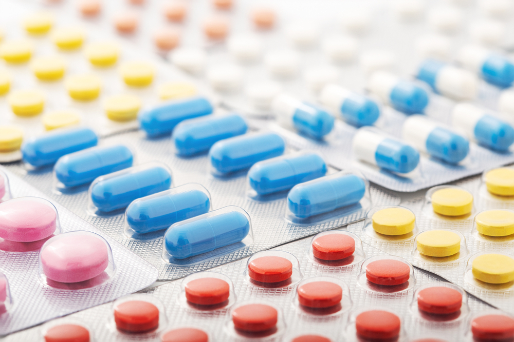 Heap,Of,Medical,Pills,In,White,,Blue,And,Other,Colors.