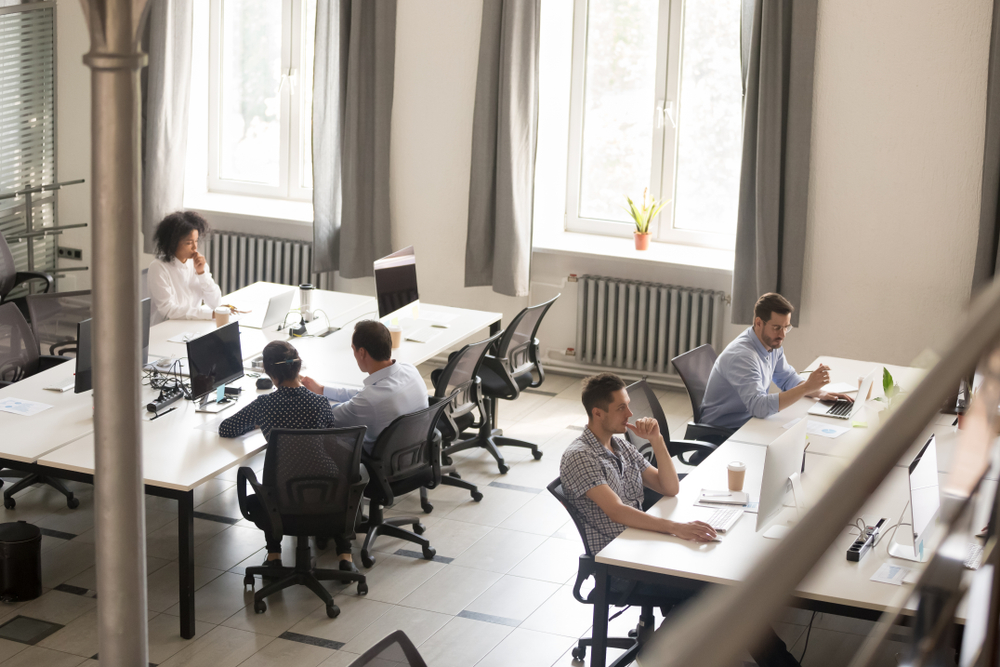 Top,View,Of,Diverse,People,Working,Together,On,Computer,Performing