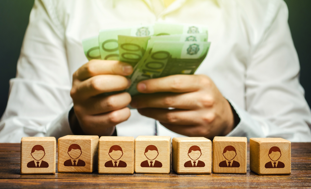 A,Man,Is,Counting,Euro,Money,In,His,Hands,Over