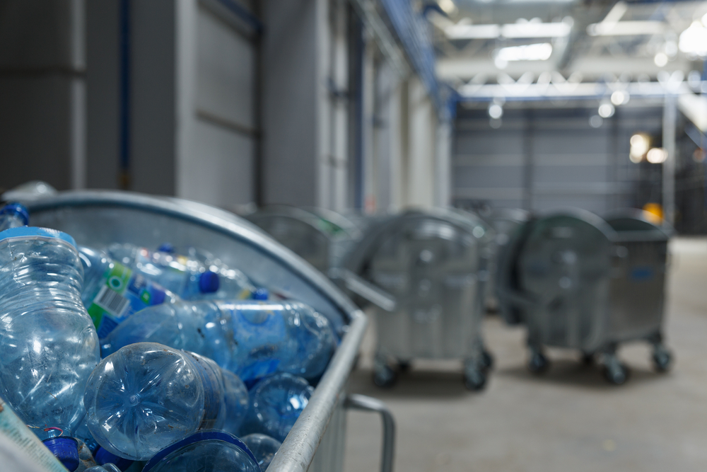 Containers,With,Used,Bottles,Of,Drinks.,Trash,Delivered,To,The