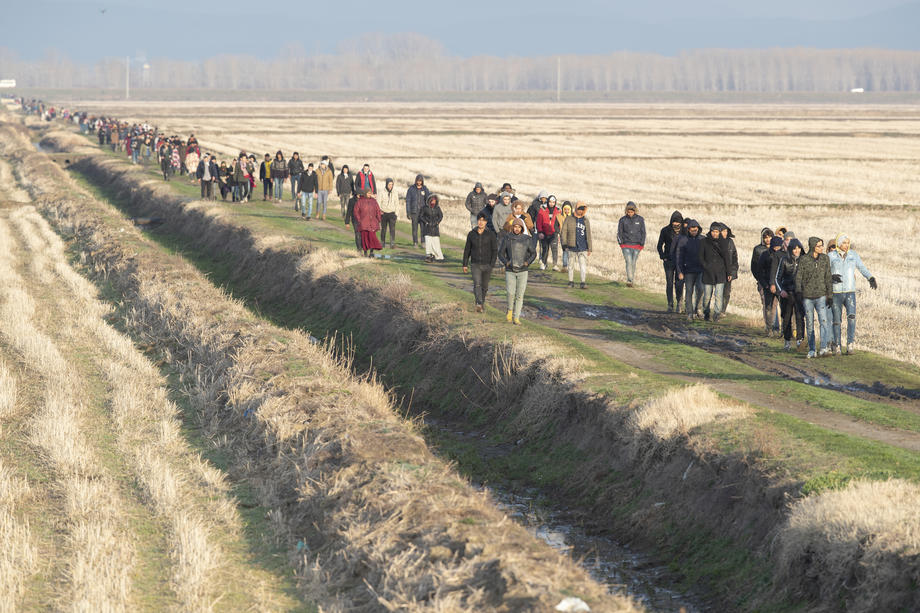 Refugees and migrants gather at the Turkish-Greek land border