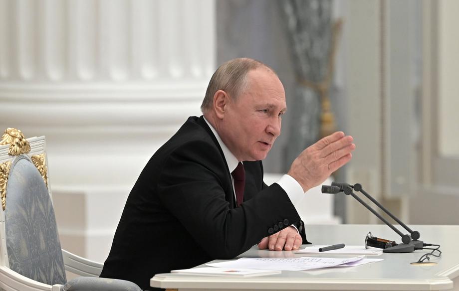 Russian President Vladimir Putin meets with members of the Security Council in Moscow