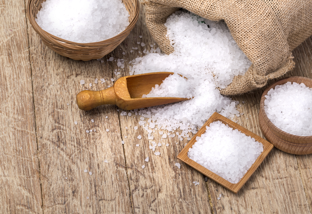 Sea,Salt,In,The,Bag,And,With,Wooden,Spoon,On
