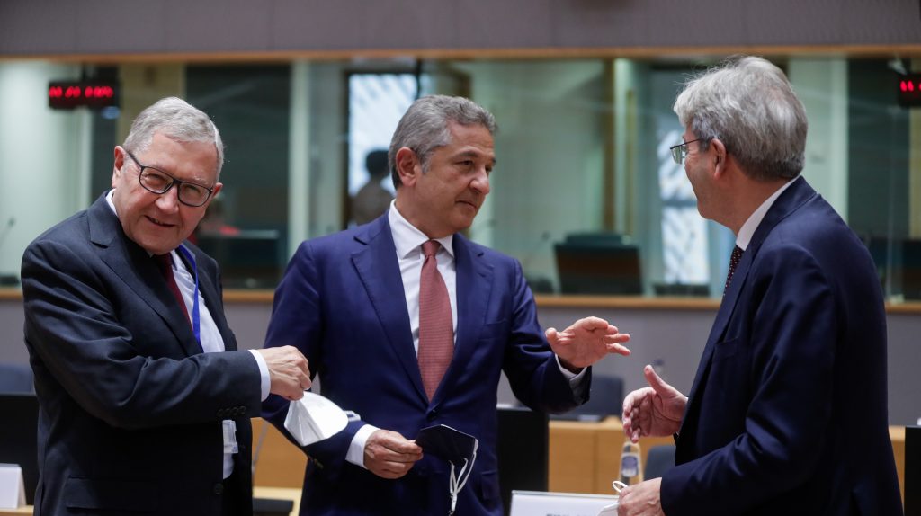 epa09340250 Managing Director of the European Stability Mechanism Klaus Regling (L), Member of the Executive Board of the ECB Fabio Panetta and European Commissioner for Economy Paolo Gentiloni (R) during a meeting of Eurogroup Finance Ministers, at the European Council in Brussels, Belgium, 12 July 2021. Finance ministers will exchange views on the international dimension of euro area economic and financial policies with Janet Yellen, the United States Secretary of the Treasury. The discussion is expected to focus on the economic recovery as well as on banking and financial stability issues.  EPA-EFE/STEPHANIE LECOCQ