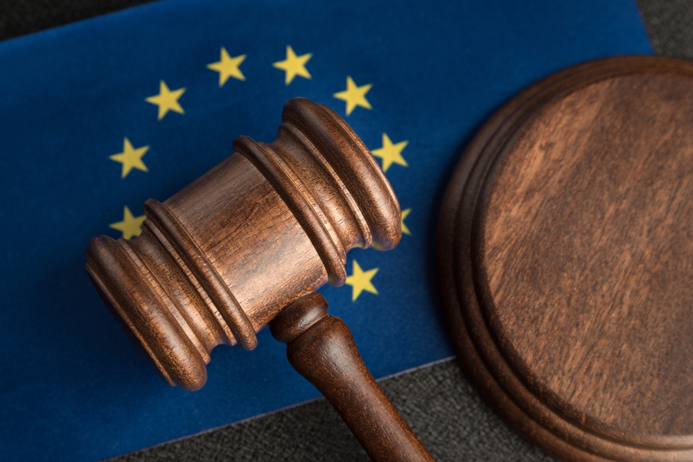 Judge,Gavel,Over,European,Union,Flag.,Training,Jurisprudence,In,Europe.