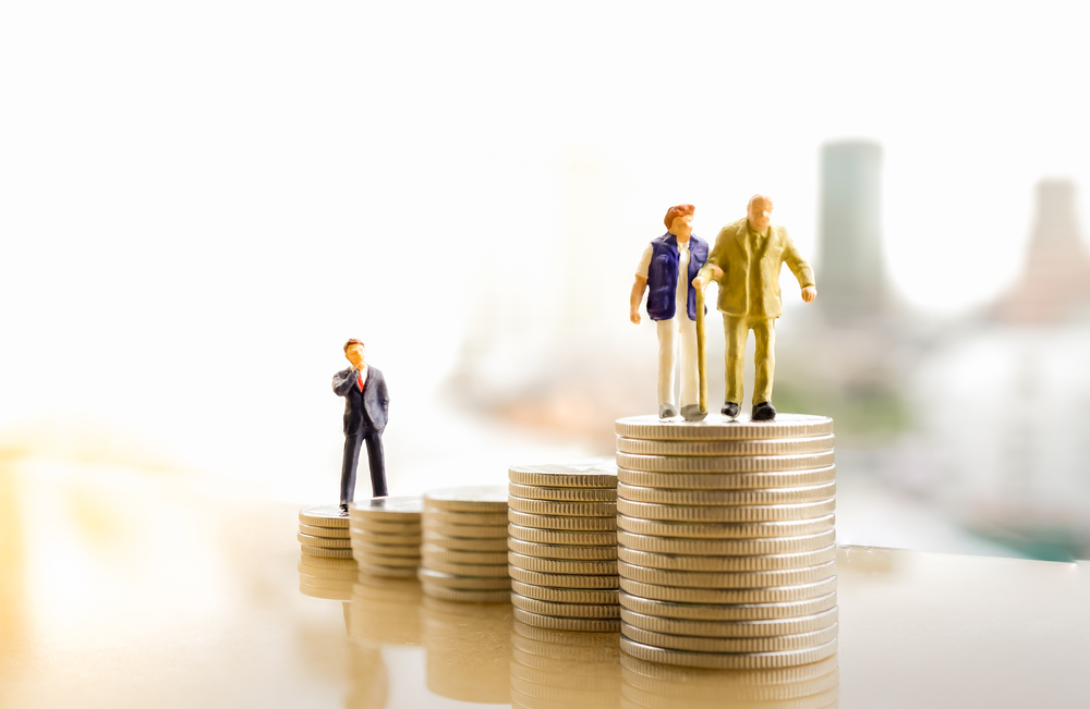 Concept,Of,Retirement,Planning.,Miniature,People:,Old,Couple,Figure,Standing