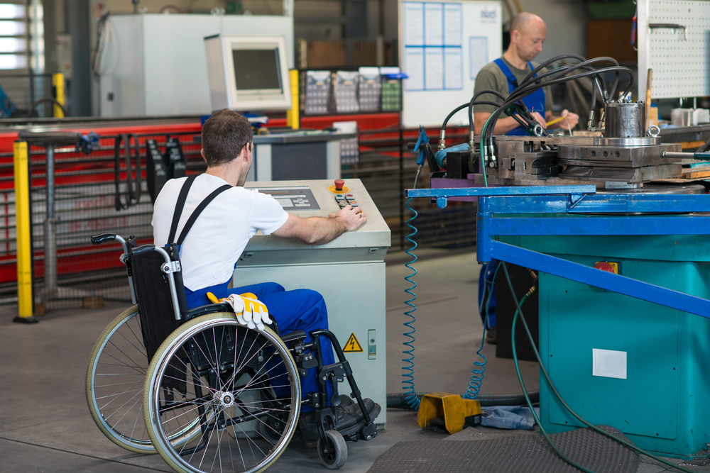 Disabled,Worker,In,Wheelchair,In,Factory,On,The,Machine