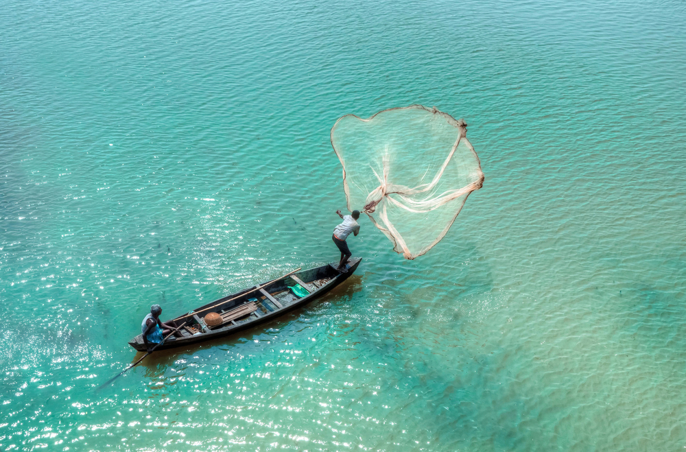 Duliajan,,India,2013,-,A,Man,Cast,His,Fishing,Net