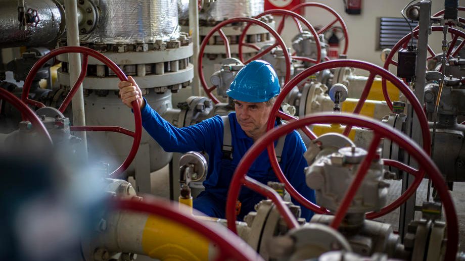 epa10122762 An employee checks valve control wheel at the underground gas storage facility operated by RWE Gas Storage CZ near Haje u Pribrami, Czech Republic, 15 August 2022. The voluntary commitment by EU member states from the summer 2022 to reduce gas consumption by 15% means that the Czech Republic will have to save about a billion cubic meters at the national level.  EPA-EFE/MARTIN DIVISEK