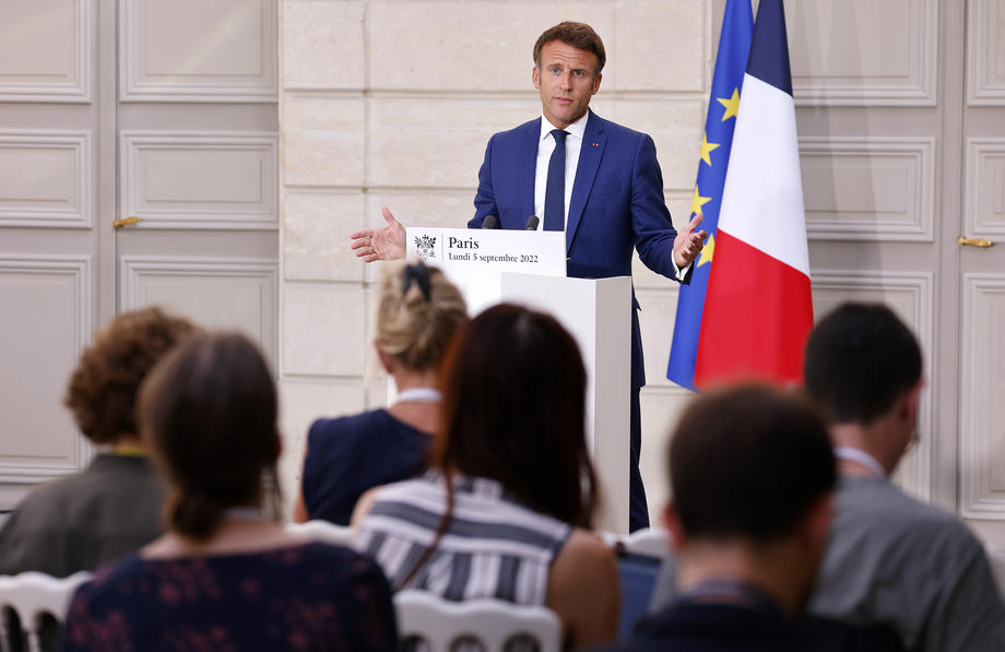 French President Macron addresses the media following talks with German Chancellor Scholz via video link