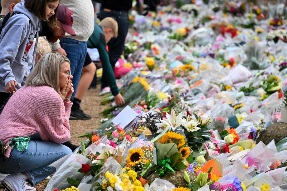 People pay their respects to Queen Elizabeth II at the Sandringham Estate