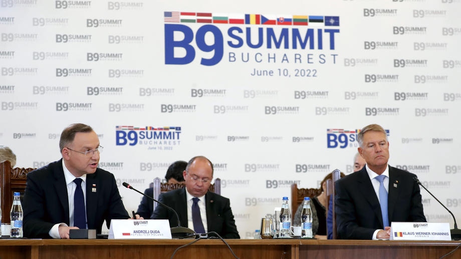 epa10005933 Polish President Andrzej Duda (L) delivers his opening speech as Romania&rsquo;s President Klaus Iohannis (R) looks on during the Bucharest Nine Summit (B9) at Cotroceni Presidential Palace, in Bucharest, Romania, 10 June 2022. The B9 is an initiative launched by Romania and Poland with the participation of NATO member states on the Eastern Flank of the Alliance: Bulgaria, Czech Republic, Estonia, Latvia, Lithuania, Poland, Romania, Slovakia and Hungary. The first B9 Summit was held in Bucharest in November 2015.  EPA-EFE/ROBERT GHEMENT